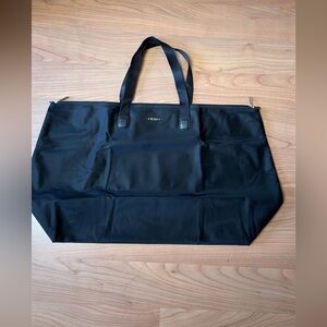Tumi “Just in Case” large zip packable tote